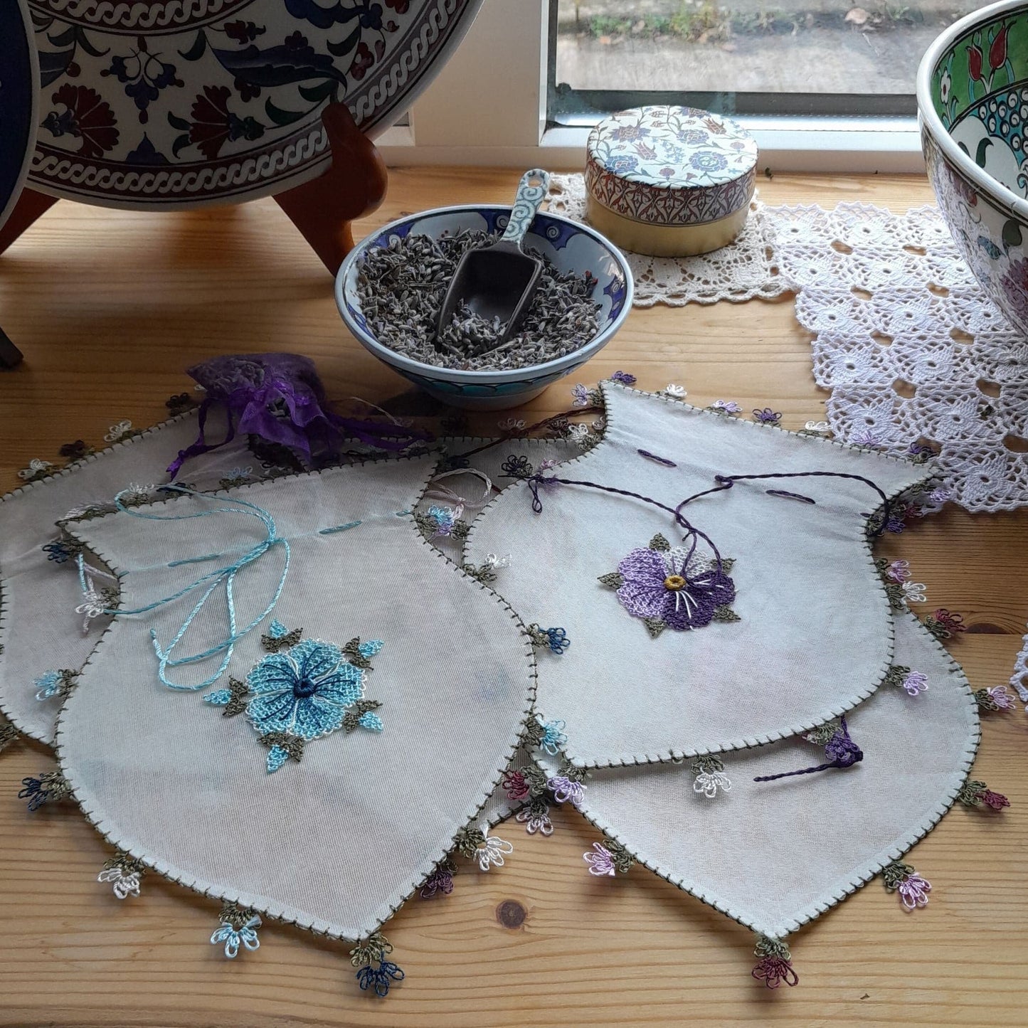 large handmade Turkish silk pouches, needle lace hem, floral motifs