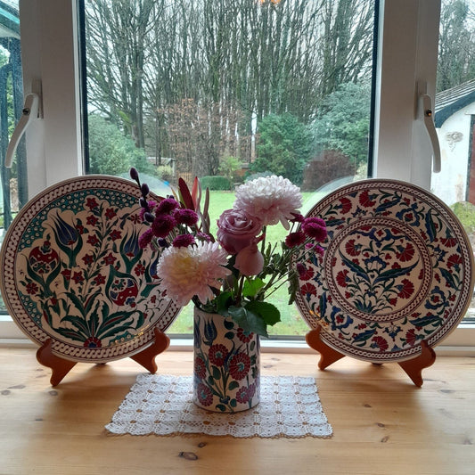 Large Iznik ceramic  plates, carnation and tulip designs, multi colour motifs, comes in a velvet gift box