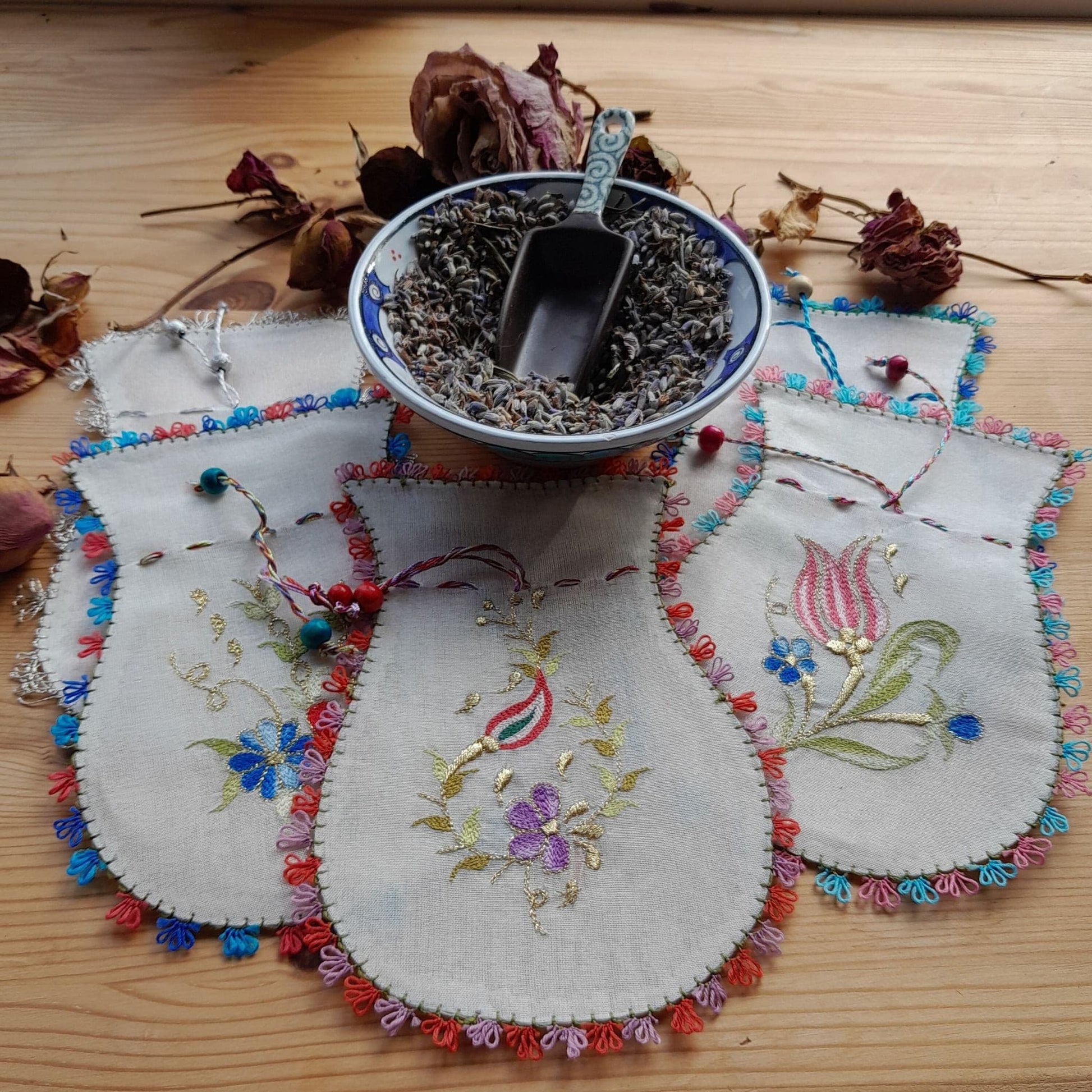 Small Handmade Turkish Silk Pouches, cream colour organza, multi colour traditional Turkish floral designs, needle lace hem, embroidered floral patterns